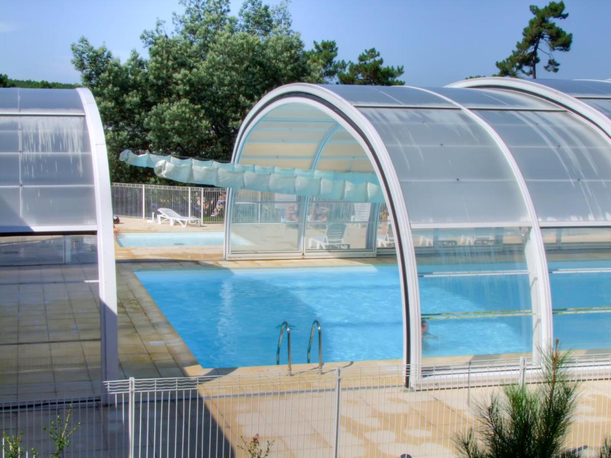Village Vacances Les Dunes - Domaine De Bombannes 卡尔康 外观 照片